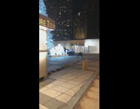 Girl poses in front of snowflake decoration 