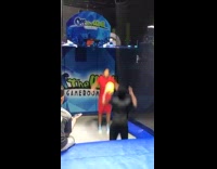 Guy dunks on friend at trampoline park