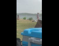 Blue bikini girl grass black railing cooler 