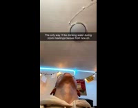 Guy has water dispenser above him from roof