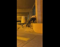 Guy fails to do bike trick in parking garage 