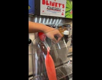 Girl gets slurpee in huge wine glass