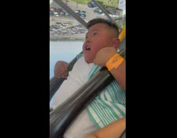 Kid Passes Out on an Amusement Park Ride