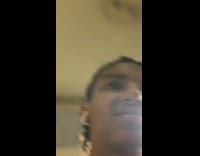 Rat gets stuck inside hole on side of stairs and half of its body with tail sticks out of the wall