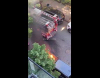 Fire Burns Outside Apartment 