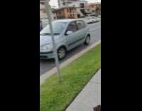 Man push up exercise sidewalk video shoot