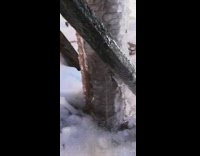 Water flows under layer of ice 