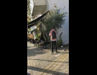 IITW - Man in pink hoodie pic of woman reading