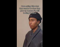 Man Ponders as He Stands on Room