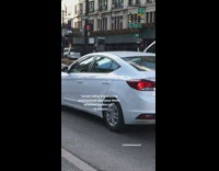 Small pink toy three wheel car guy 