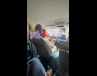 Taxi driver plays flute during the ride