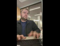 Guy shows what he does at his office job 