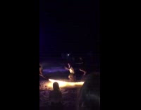 MUSIC Fire jumprope fail on beach at night