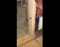 Wire perfect fit through removed wood knothole