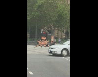 Two man flex muscle photo shoot street