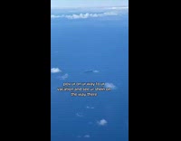 Woman sees ship sailing from plane 