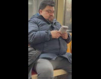 Man with Sunglasses on Mouth Plays Gameboy