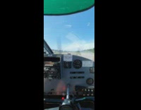 Pilots flies plane next to beach