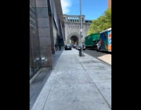 Collab WINY - Black car drive on sidewalk during traffic