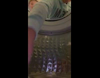 Camera phone placed inside the laundry machine