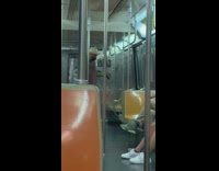 Brown shirt guy resistance band subway train 