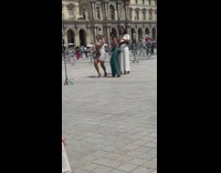 Four women practice sing and dance plaza