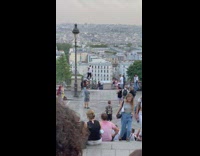 Guy climb pole balance ball on head