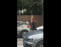 Couple spin hug wood panel picture