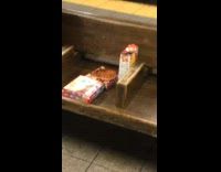 Guy cooks food in subway station on electric grill plugged in
