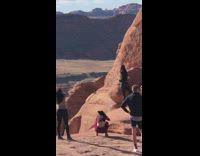 Woman black top leggings pose Rock Arches