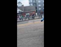 Mascot woody pulled by stranger from parade