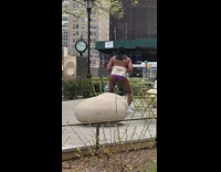 Guy Poses Shirtless by Squatting