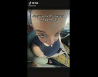 Guy takes wide angle photo of girlfriends forehead 