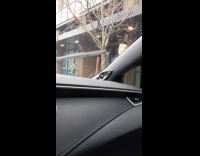 Two guys wear Starbucks hat in rain