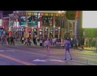 Woman in beige top poses in the middle of the street