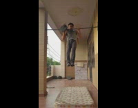 Guy lifts weight with neck 