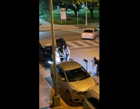Four Ladies Dance in front of Black Car for Video 