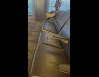 Lady Dances and Spins at Airport Foyer