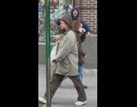 Man with Dead Hawk Talks with Friend