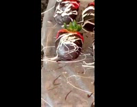 Black pug dog chocolate strawberry white icing 