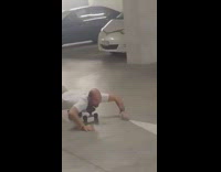 Guy on stomach rides skateboard under friends legs fail