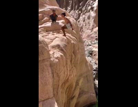 Guy does backflip lands on back in water