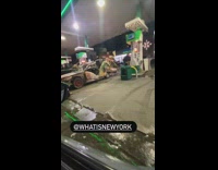 Dragon car getting gas at gas station