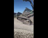 Bulldozer leans back and forth 