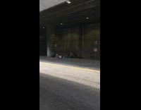 Woman white bonnet balance pose middle tunnel road