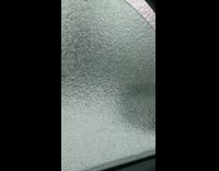 Guy roll down car window and punch ice