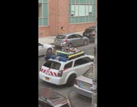 Man open trunk ghost busters customized car