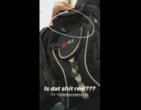 Giant bug on guys black backpack on subway train