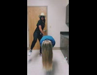 Woman pretends to ride friend like horse 