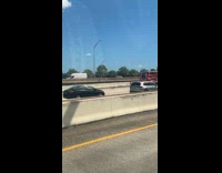 Burned car causes traffic at the highway